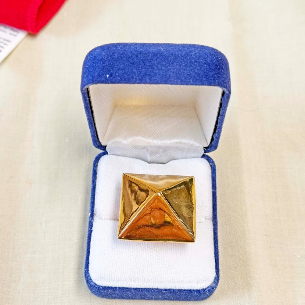 RING, KENNETH JAY LANE, GOLD TONE TRIANGLE, SIZE 8, SQUARE 1 INCH EA. SIDE,